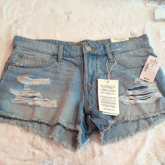Bootlegger's Footwear Pants - Ripped Light Blue Denim Shorts